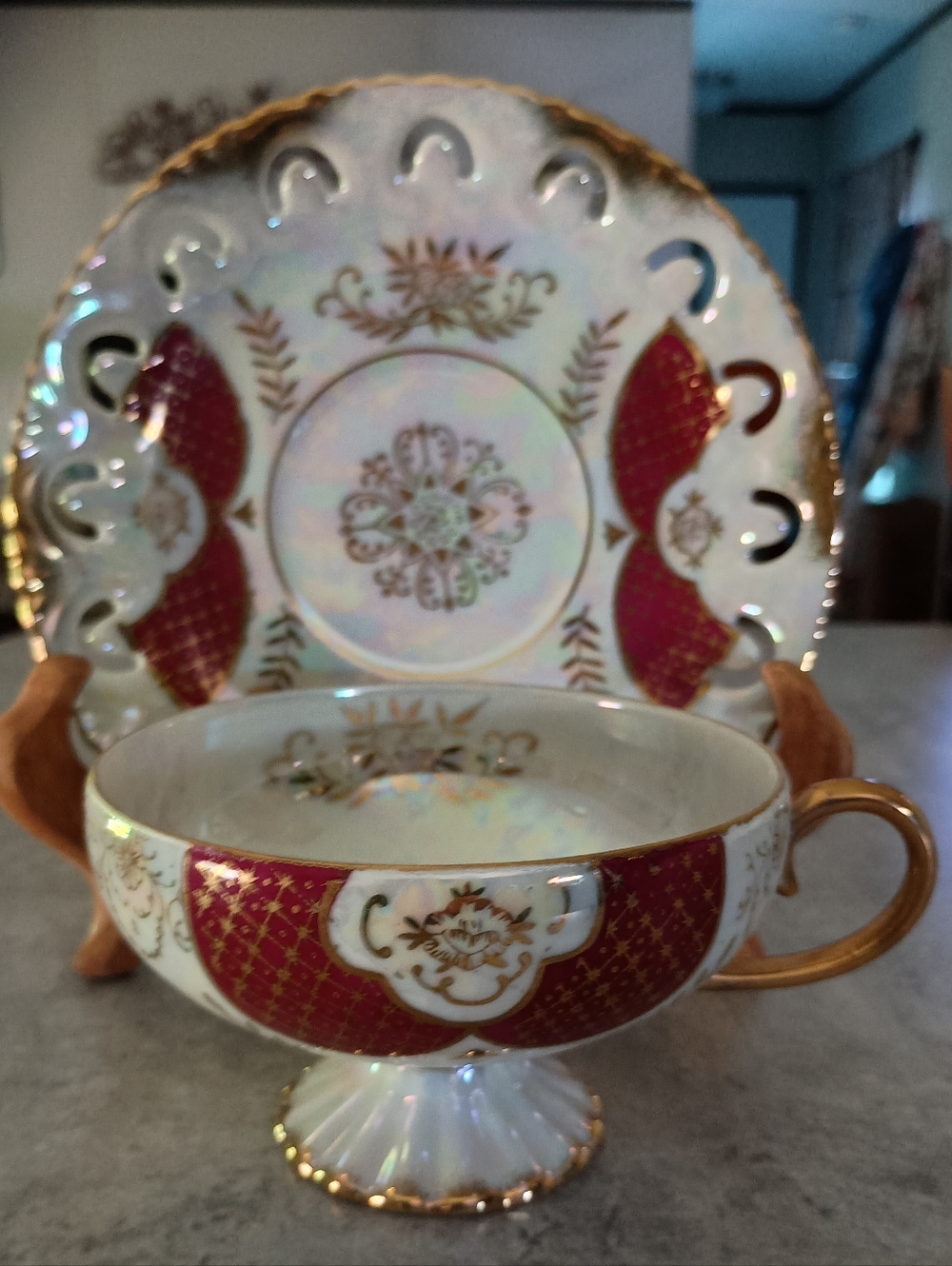 Iridescent Gold-Trimmed Red and White Pedestal Tea Cup and Saucer